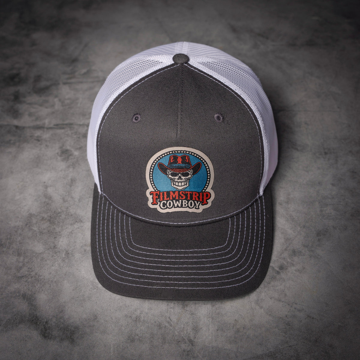 Filmstrip Cowboy™ Gray Trucker Hat
