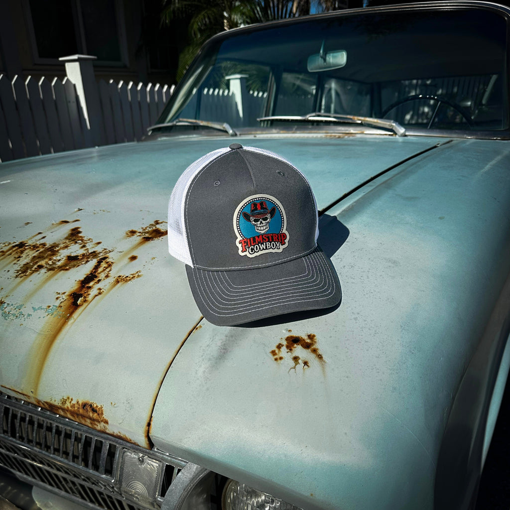 Filmstrip Cowboy™ Gray Trucker Hat
