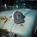 Filmstrip Cowboy™ Gray Trucker Hat