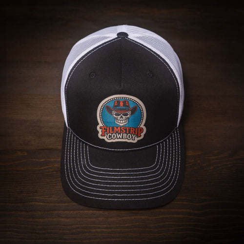 Filmstrip Cowboy™ Black Trucker Hat
