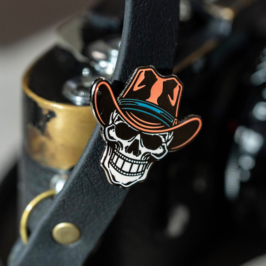 Filmstrip Cowboy™ Enamel Pin