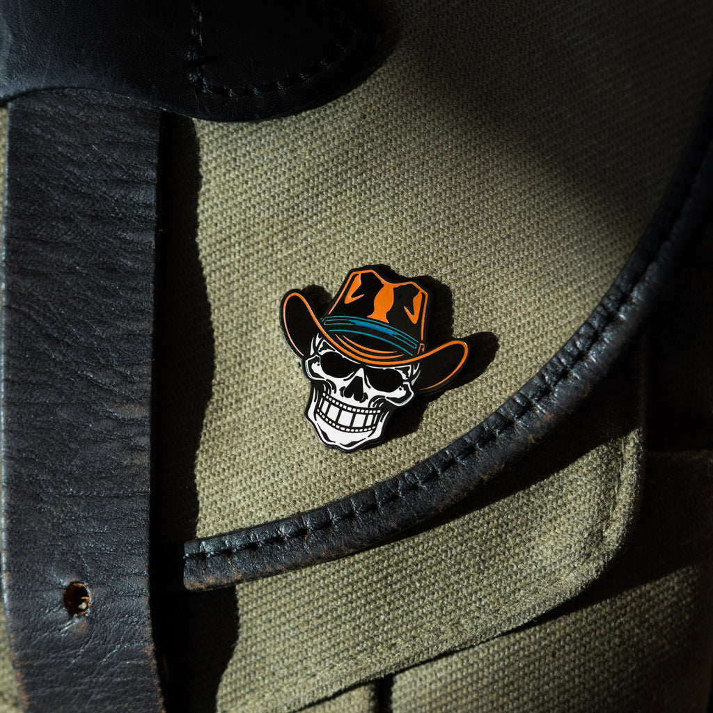 Filmstrip Cowboy™ Enamel Pin