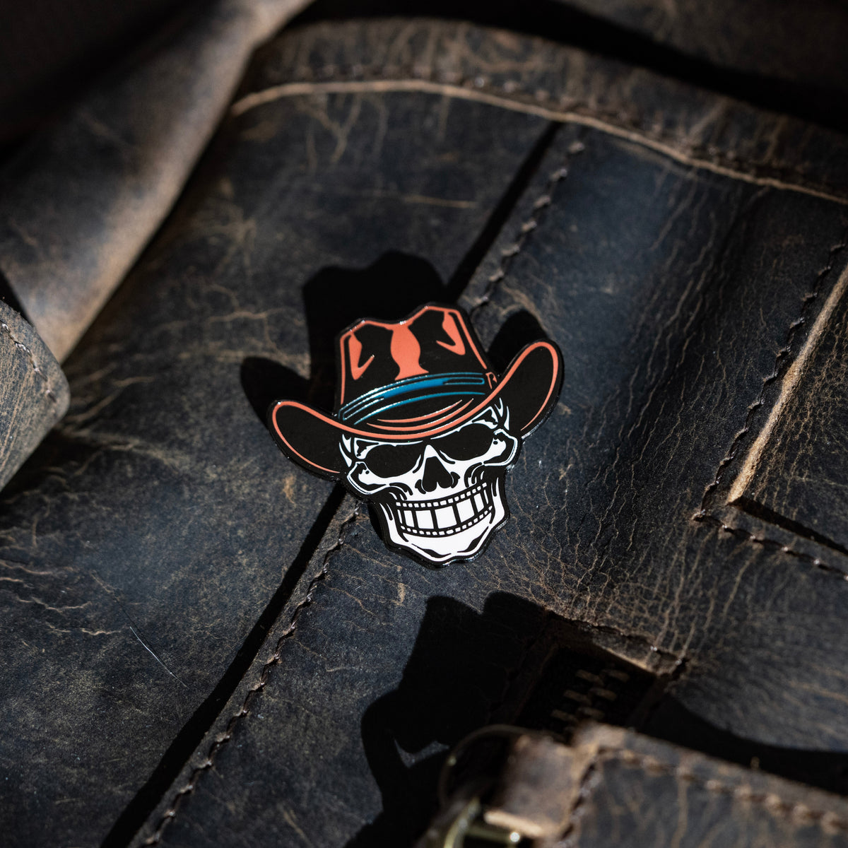 Filmstrip Cowboy™ Enamel Pin