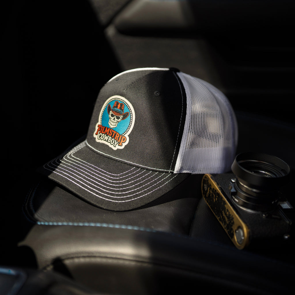 Filmstrip Cowboy™ Black Trucker Hat