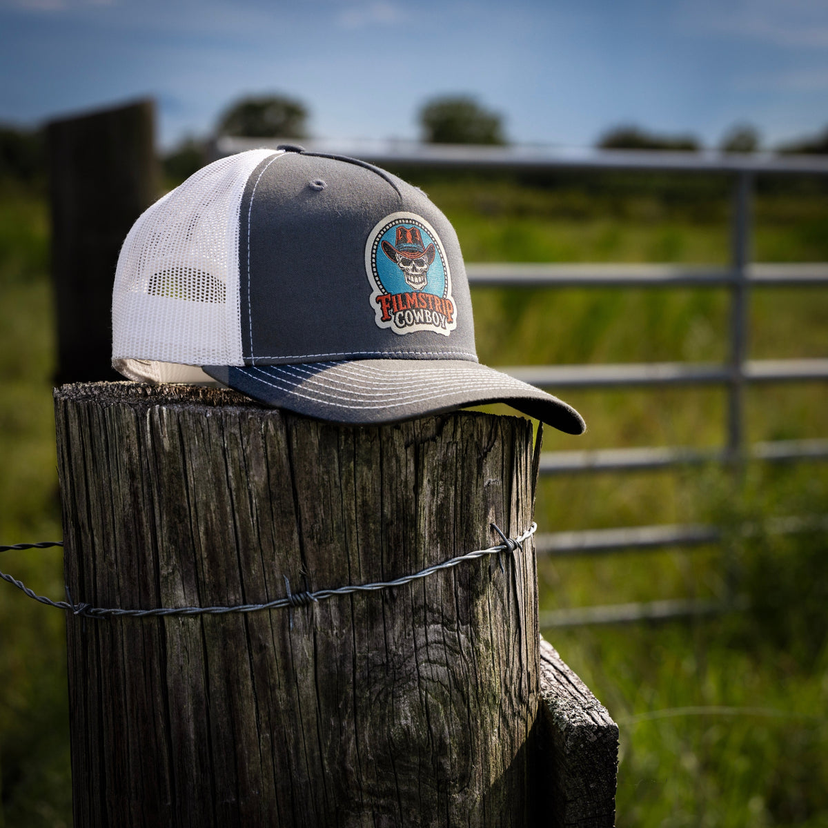 Filmstrip Cowboy™ Gray Trucker Hat